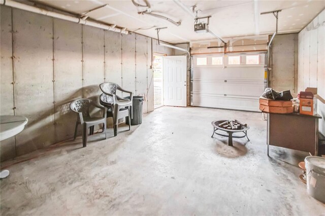 1100 W Main St, Grafton, IL 62037 - garage featuring a garage door opener