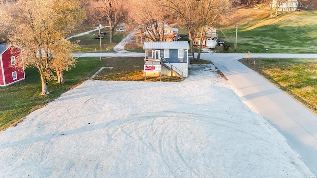 1100 W Main St, Grafton, IL 62037 - view of green lawn featuring driveway