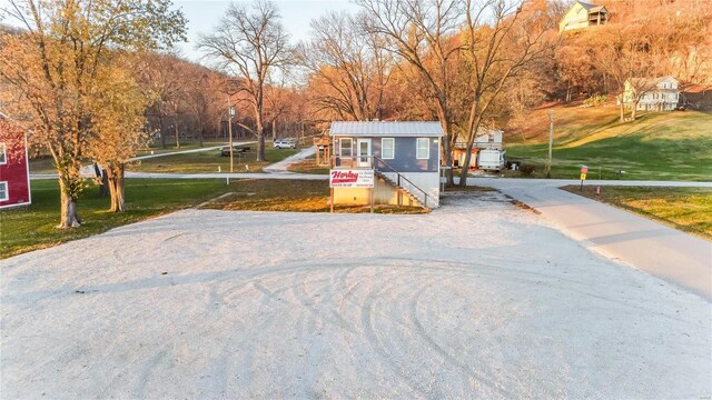 1100 W Main St, Grafton, IL 62037 - view of front of property with driveway and a front yard