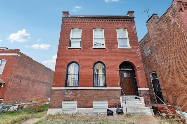3833 Marine Ave, Saint Louis, MO 63118 - view of front facade with brick siding and fence