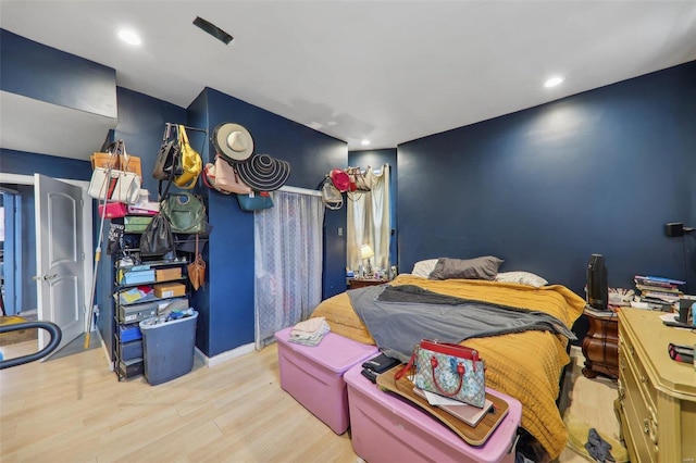 3833 Marine Ave, Saint Louis, MO 63118 - bedroom with wood finished floors and recessed lighting