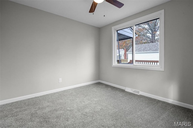 1021 Lakeview Ave, Saint Louis, MO 63138 - carpeted spare room featuring baseboards and ceiling fan