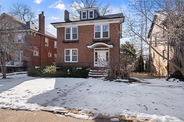 6954 Kingsbury Blvd, University City, MO 63130 - american foursquare style home with brick siding and a chimney