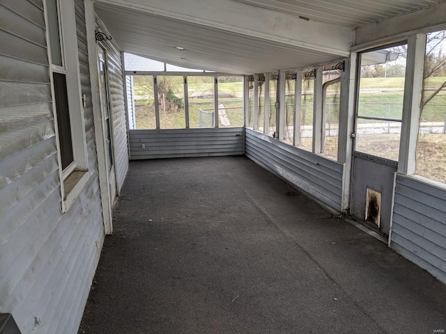 unfurnished sunroom with plenty of natural light