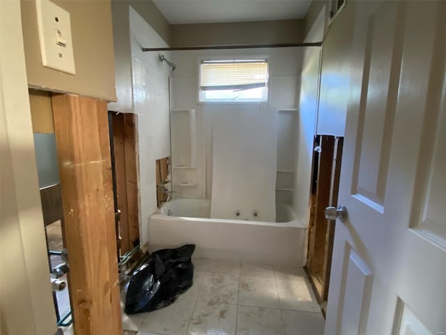 full bathroom featuring bathtub / shower combination and tile patterned flooring