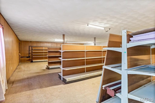 501 Lewis St, Park Hills, MO 63601 - unfurnished bedroom with wood walls and tile patterned floors