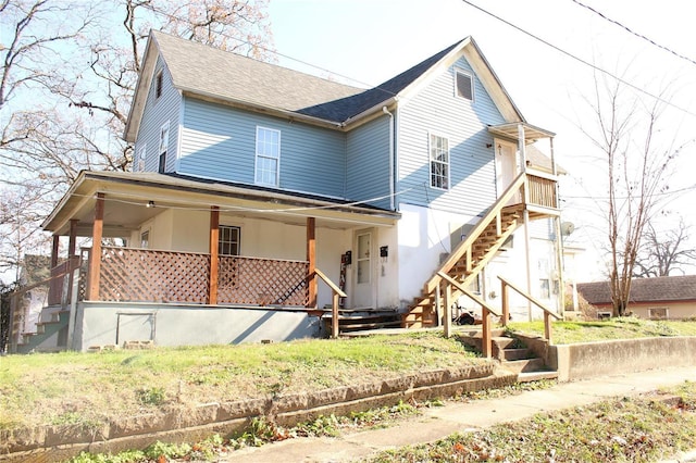 842 Kinzer St, Poplar Bluff, MO 63901 - view of front of home with stairs, covered porch, and roof with shingles