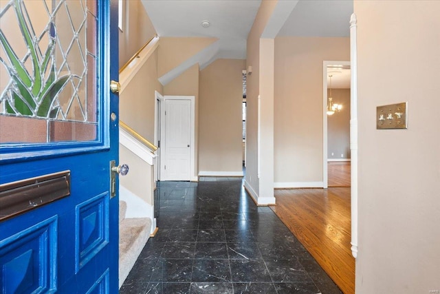 4361 Laclede Ave, Saint Louis, MO 63108 - entrance foyer featuring stairs and baseboards