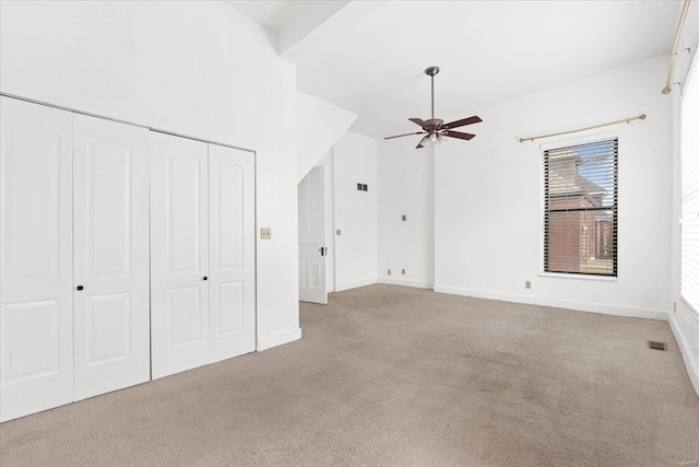 4361 Laclede Ave, Saint Louis, MO 63108 - unfurnished bedroom with carpet floors, baseboards, a closet, and a ceiling fan
