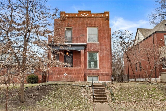 4361 Laclede Ave, Saint Louis, MO 63108 - back of property with brick siding, a balcony, and stairway
