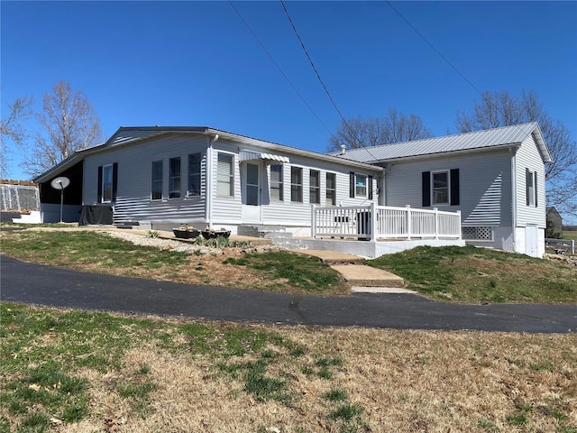 view of front of property with metal roof