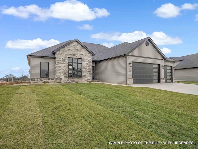 428 Hayden Dr, Waterloo, IL 62298 - view of front of home featuring stone siding, an attached garage, concrete driveway, a front yard, and a shingled roof