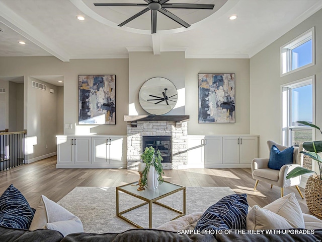 428 Hayden Dr, Waterloo, IL 62298 - living area featuring light wood finished floors, ceiling fan, a stone fireplace, recessed lighting, and baseboards
