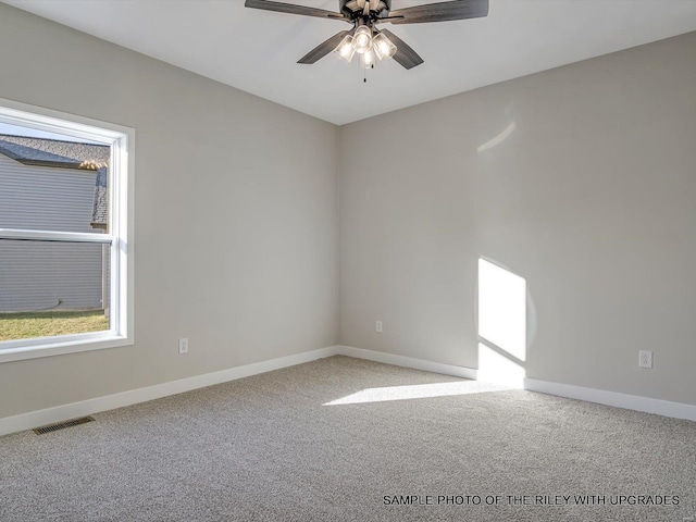 428 Hayden Dr, Waterloo, IL 62298 - spare room featuring ceiling fan, light colored carpet, and baseboards