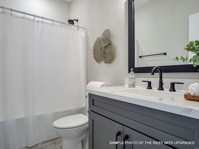 428 Hayden Dr, Waterloo, IL 62298 - full bathroom featuring marble finish flooring, toilet, shower / bathtub combination with curtain, and vanity