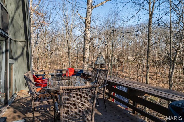 451 Foxfire Point Dr, Wright City, MO 63390 - wooden terrace featuring outdoor dining space