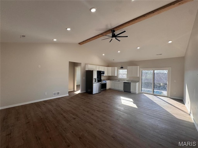 unfurnished living room featuring beamed ceiling, dark wood-style floors, baseboards, a ceiling fan, and recessed lighting