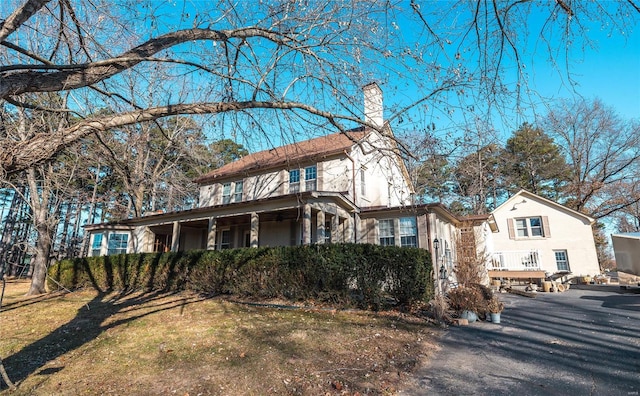 view of front of property with a chimney