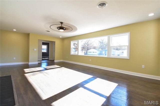 305 E Hauser St, Litchfield, IL 62056 - empty room featuring dark wood-type flooring, baseboards, and recessed lighting