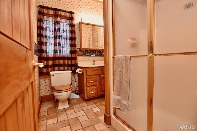 26 Gap Rd, Tunas, MO 65764 - bathroom featuring a shower stall, toilet, stone finish flooring, and vanity