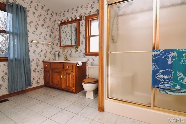 26 Gap Rd, Tunas, MO 65764 - bathroom with wallpapered walls, tile patterned floors, an enclosed shower, vanity, and toilet