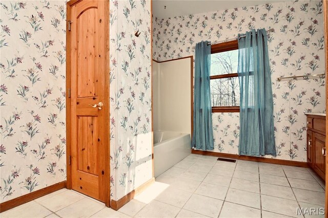 26 Gap Rd, Tunas, MO 65764 - full bathroom featuring wallpapered walls, baseboards, tile patterned floors, a tub, and vanity