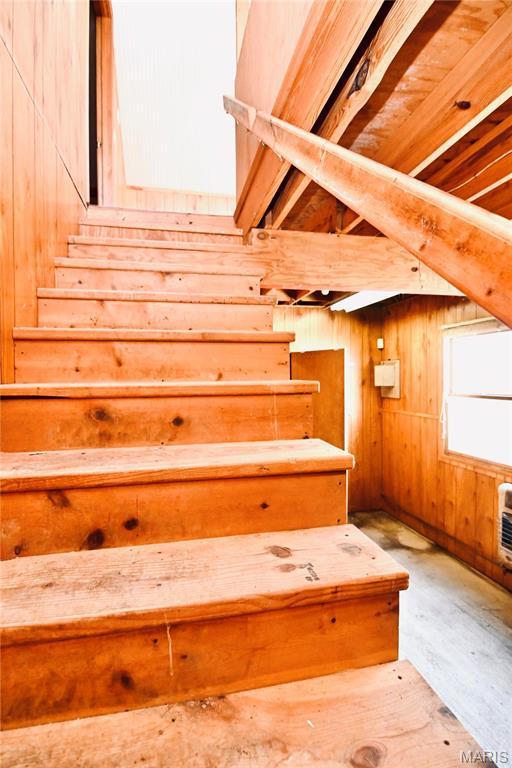 26 Gap Rd, Tunas, MO 65764 - staircase featuring wooden walls