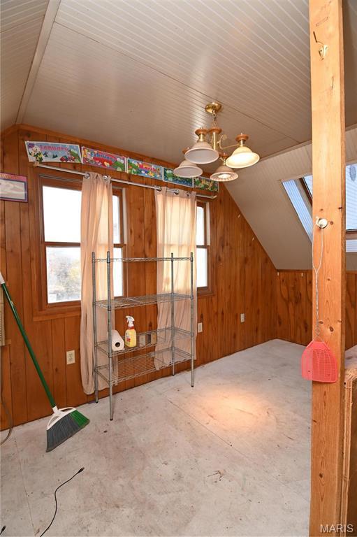 26 Gap Rd, Tunas, MO 65764 - additional living space featuring lofted ceiling and wood walls