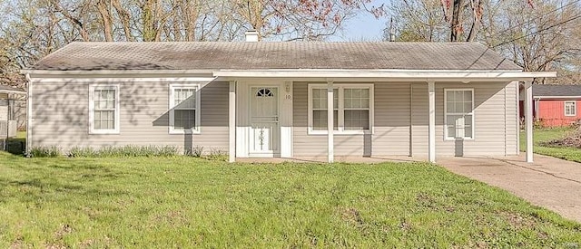 single story home with a front yard, a chimney, and a porch