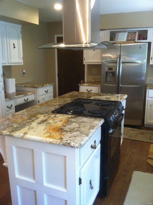 694 E 2735th Ave, Ramsey, IL 62080 - kitchen featuring island exhaust hood, electric range, dark wood-style floors, stainless steel fridge, and white cabinets