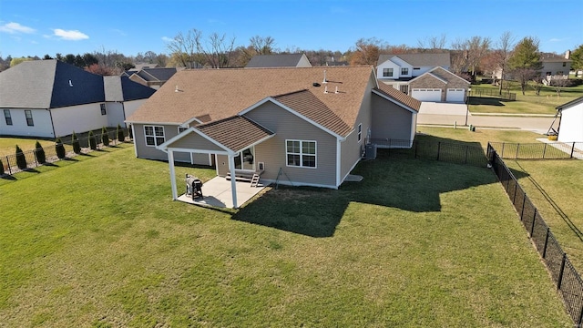 back of house with a residential view, a patio area, and central air condition unit