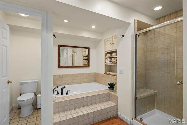 729 W Lockwood Ave, Saint Louis, MO 63122 - full bath with a stall shower, a garden tub, and recessed lighting