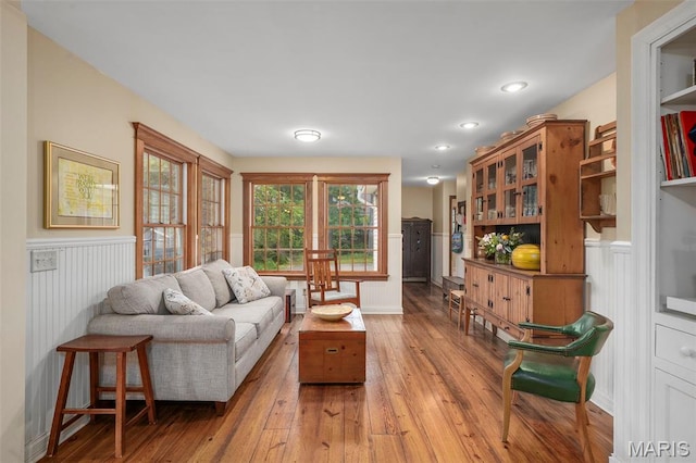 729 W Lockwood Ave, Saint Louis, MO 63122 - living room featuring wainscoting and light wood finished floors