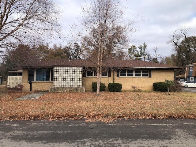 ranch-style home with brick siding