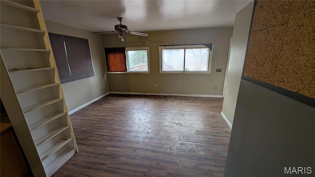 12532 Bellefontaine Rd, Saint Louis, MO 63138 - spare room featuring a ceiling fan, wood finished floors, and baseboards