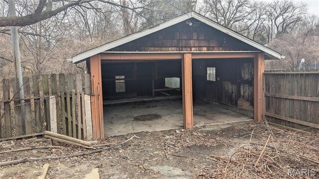12532 Bellefontaine Rd, Saint Louis, MO 63138 - view of outbuilding with fence and an outbuilding