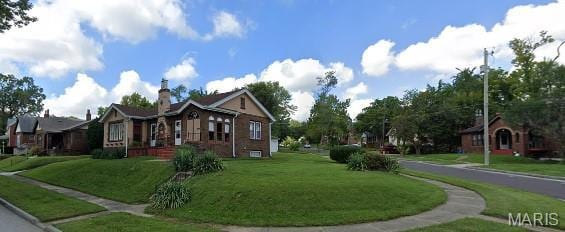 104 Emerling Dr, Saint Louis, MO 63121 - view of front of house with a front yard