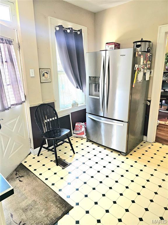 104 Emerling Dr, Saint Louis, MO 63121 - kitchen featuring stainless steel refrigerator with ice dispenser and light floors