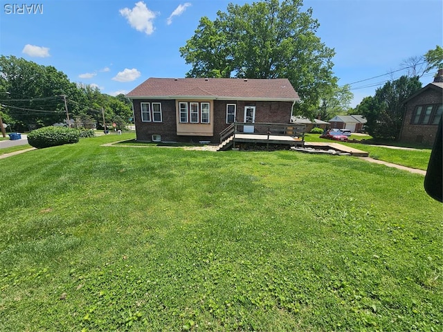 104 Emerling Dr, Saint Louis, MO 63121 - view of front of house featuring a wooden deck and a front lawn