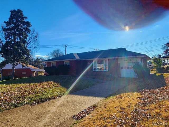 1110 Astoria Dr, Saint Louis, MO 63137 - view of front facade with driveway