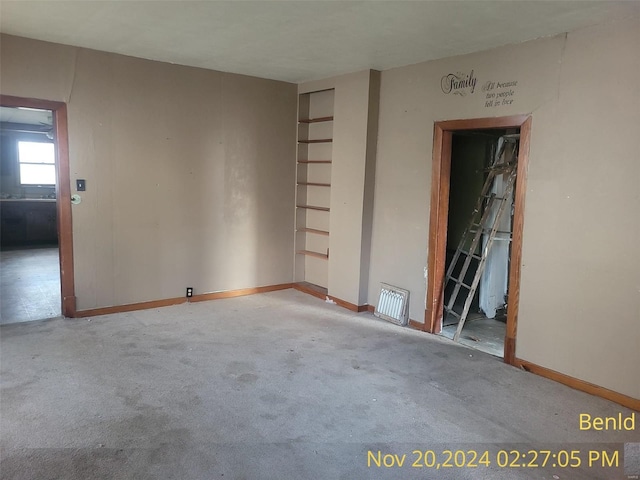 608 N 4th St, Benld, IL 62009 - empty room featuring baseboards and carpet floors