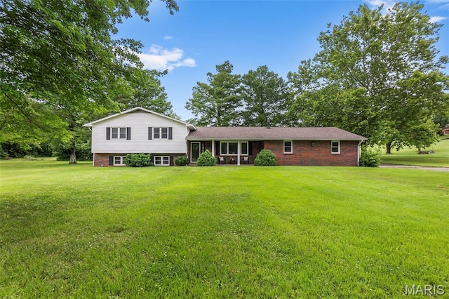 70 Garnet Ln, Cape Girardeau, MO 63701 - split level home with a front yard and brick siding