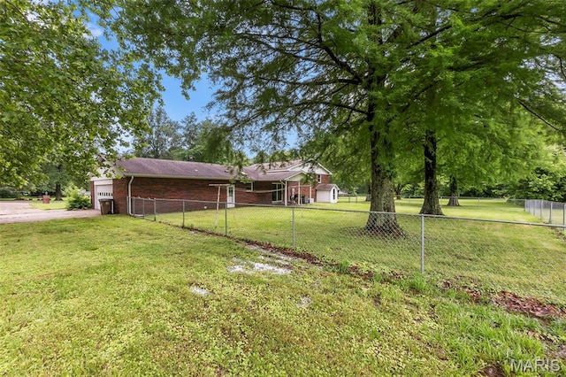 70 Garnet Ln, Cape Girardeau, MO 63701 - view of yard with an attached garage and driveway