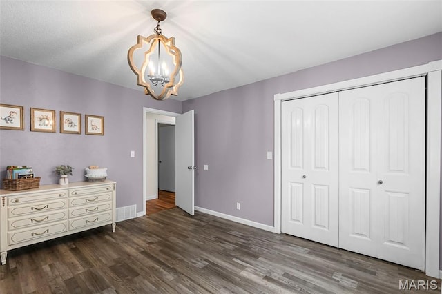 70 Garnet Ln, Cape Girardeau, MO 63701 - bedroom featuring a chandelier, dark wood-type flooring, and a closet
