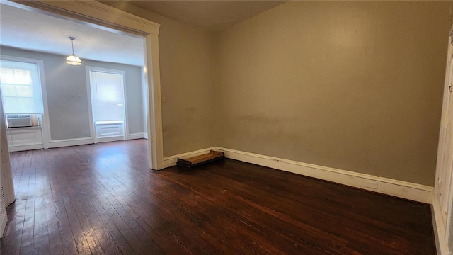 1412 Benton St, Saint Louis, MO 63106 - unfurnished room with dark wood finished floors and baseboards