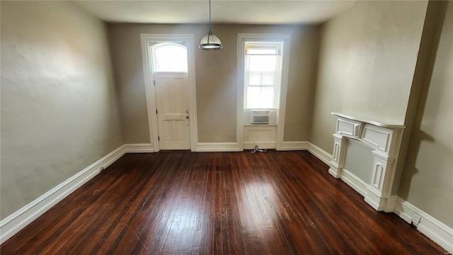 1412 Benton St, Saint Louis, MO 63106 - foyer with dark wood-style flooring and baseboards