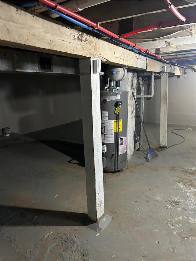3408 Airway Ave, Saint Louis, MO 63114 - unfinished basement featuring gas water heater
