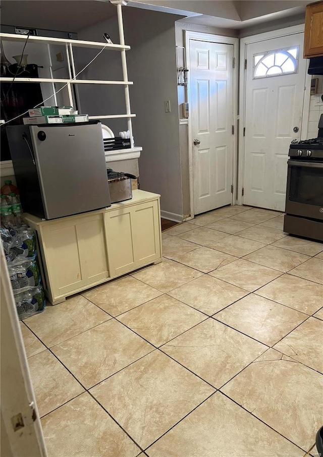 10356 Saint Matthew Ln, Saint Ann, MO 63074 - foyer entrance featuring light tile patterned floors