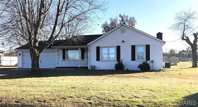 1210 N Prairie, Bloomfield, MO 63825 - ranch-style home featuring a front yard, a chimney, and covered porch