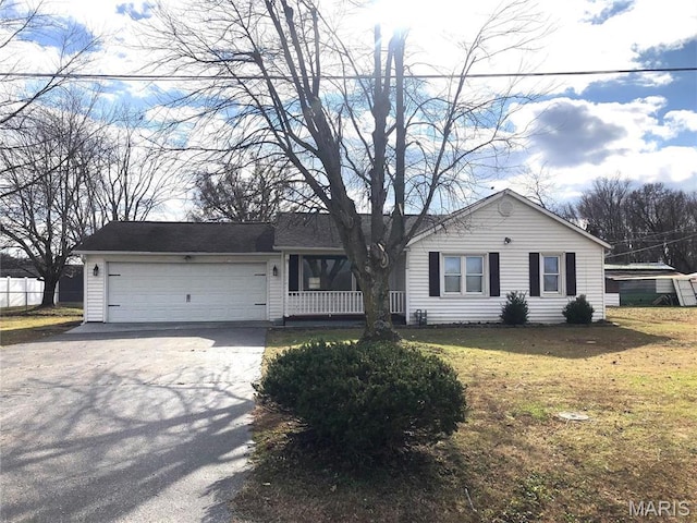 1210 N Prairie, Bloomfield, MO 63825 - ranch-style home with concrete driveway, a garage, and a front lawn